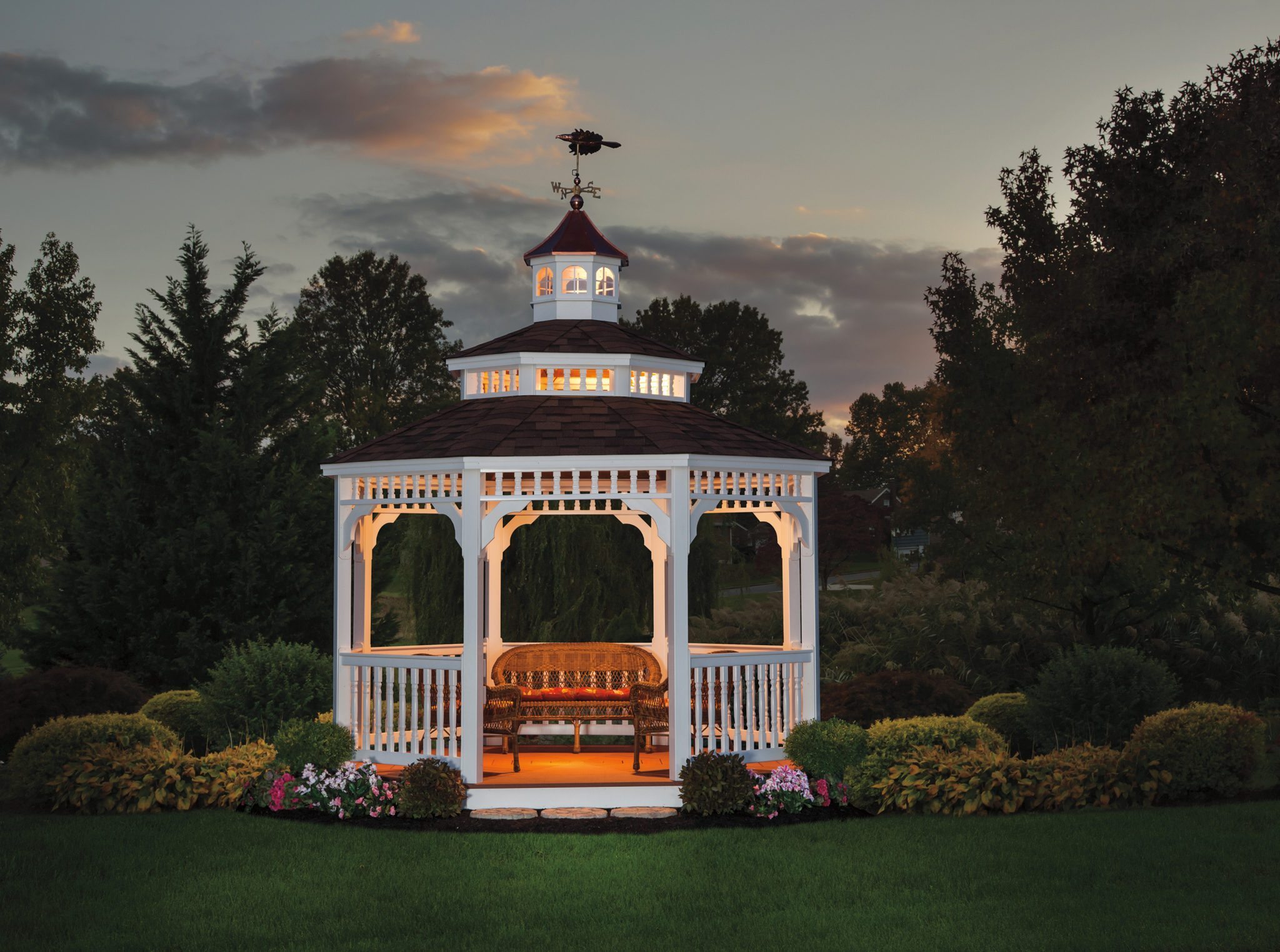 Victorian white vinyl gazebo with weather vane.