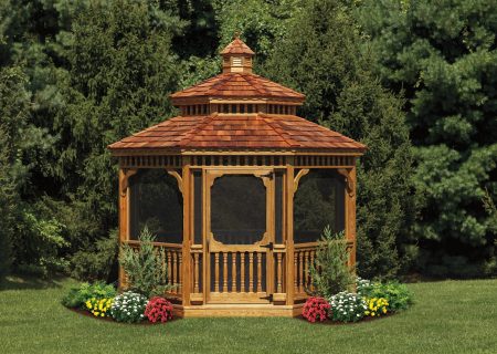 Wood gazebo with screens and door.