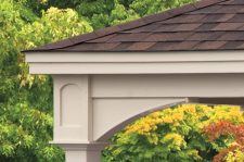 Manor pavilion header with trim corner brace.