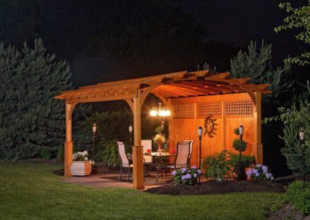 Night view of an arch roof pavilion with hanging light.