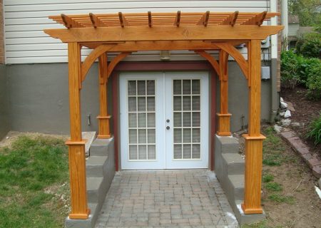 Wood pergola with cedar stain.