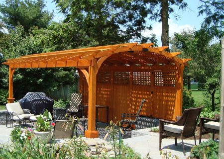 Cedar stained arched pergola.